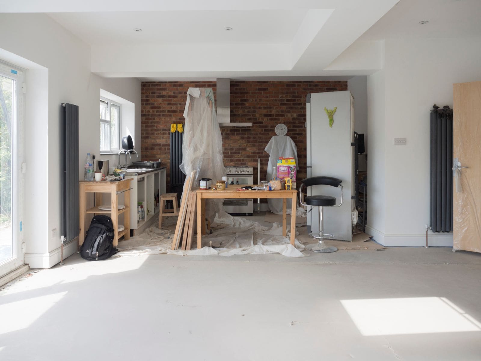 A bright residential room during renovation, shown as representative process imagery